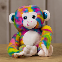 A psychedelic monkey that is 15 inches tall from head to toe with shiny blue ears and sparkle eyes