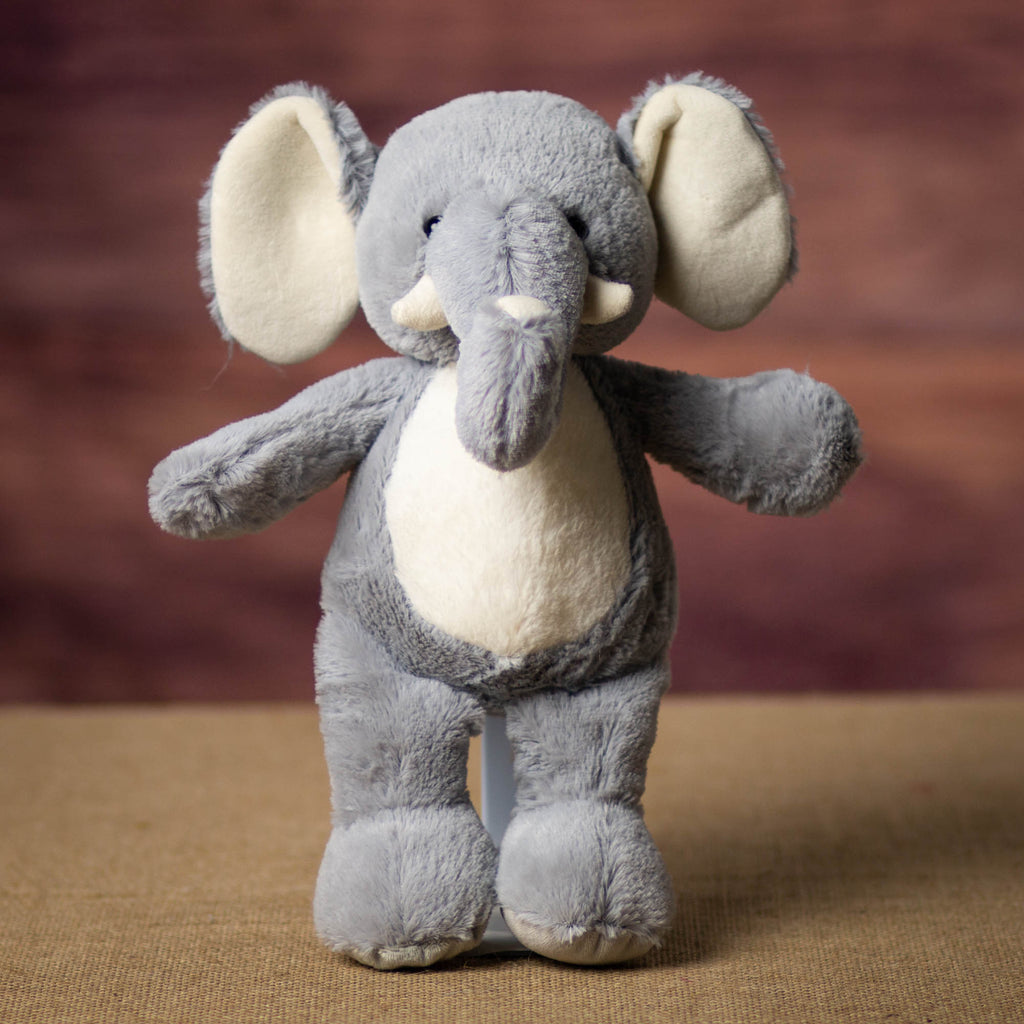 A gray elephant that is 13 inches tall while standing