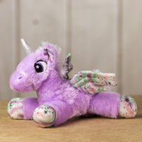 A purple unicorn that is 14 inches while laying down with embroidered eyes, shiny paws, wings and horn.