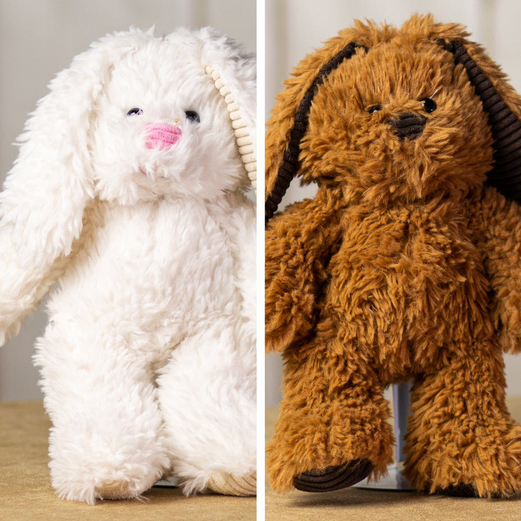 A white and brown scruffy rabbit that are 13 inches tall while standing with corduroy ears and feet