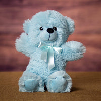 A blue bear that is 12 inches tall while standing