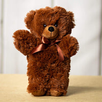 A brown bear that is 12 inches tall while standing