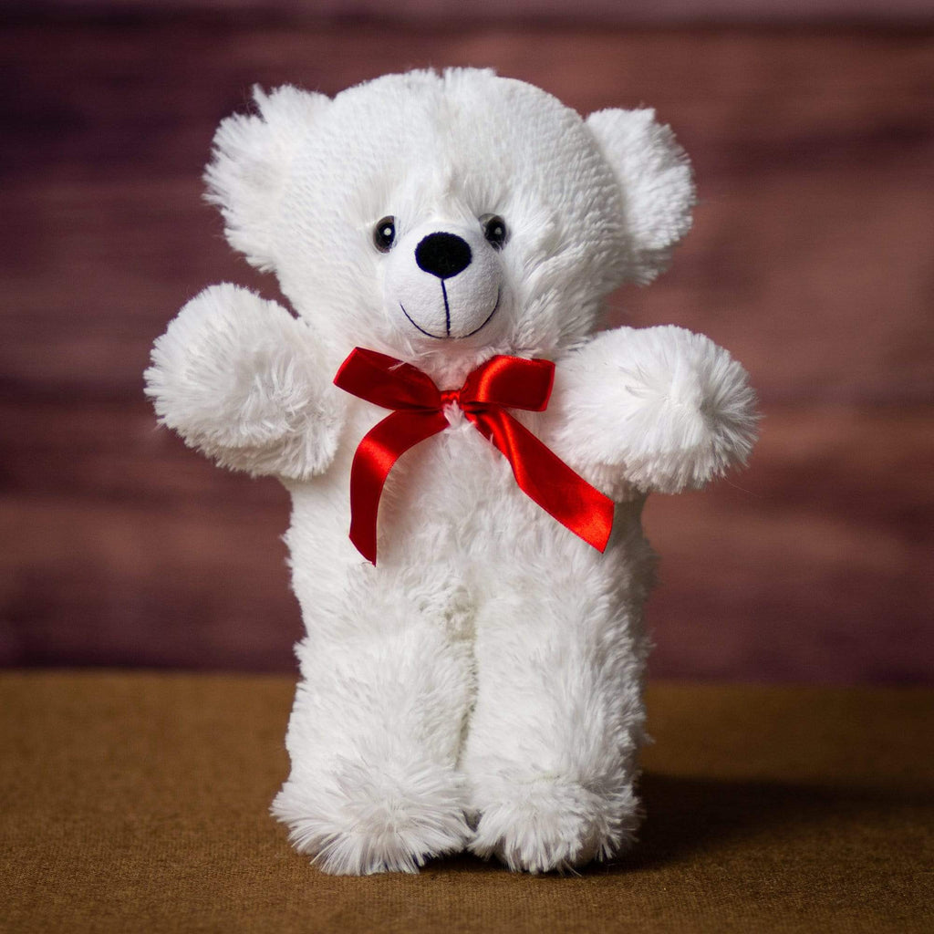 A white bear that is 12 inches tall while standing