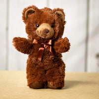 A brown bear that is 14 inches tall while standing