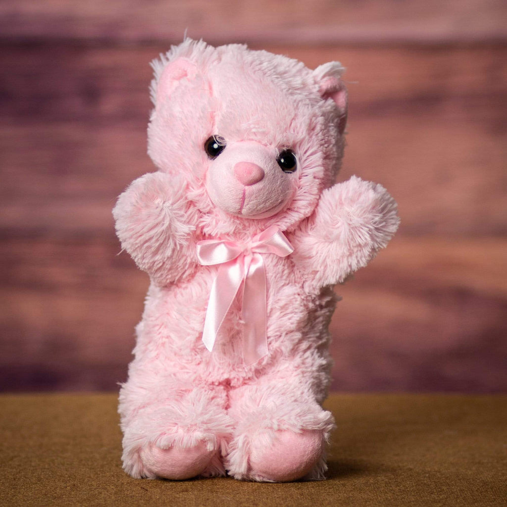 A pink bear that is 14 inches tall while standing