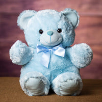 A blue bear that is 18 inches tall while standing