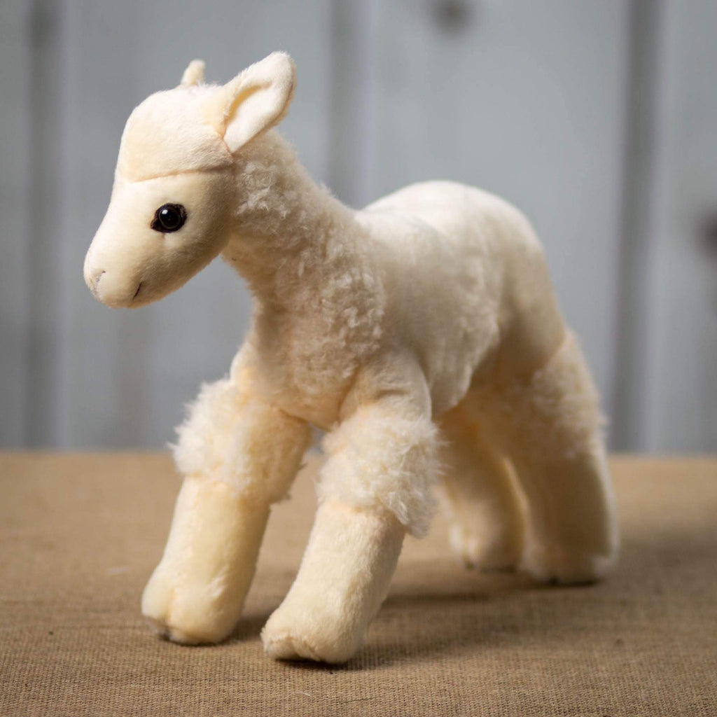 A beige llama that is 12 inches tall while standing