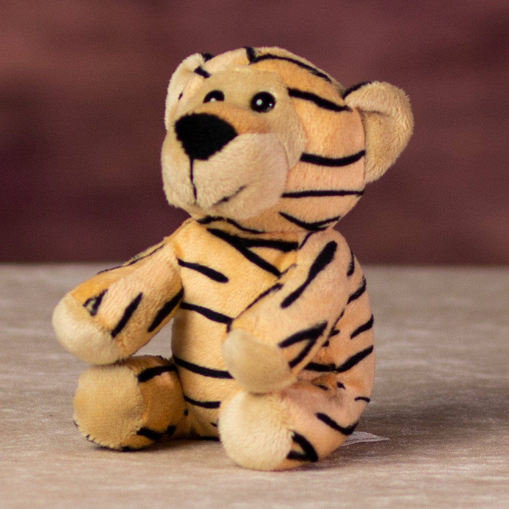 A stripped tiger that is 13 inches tall while sitting