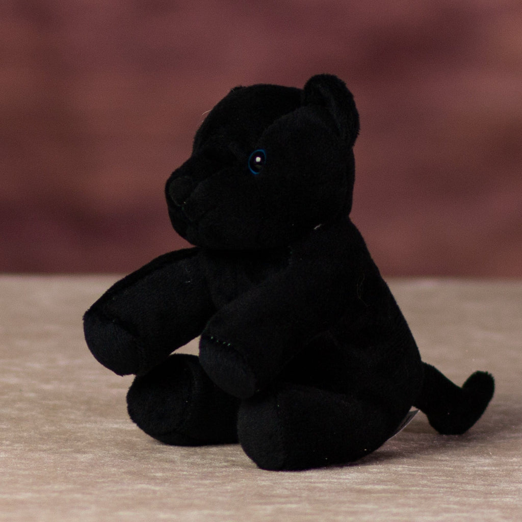 A black panther that is 5 inches tall while sitting