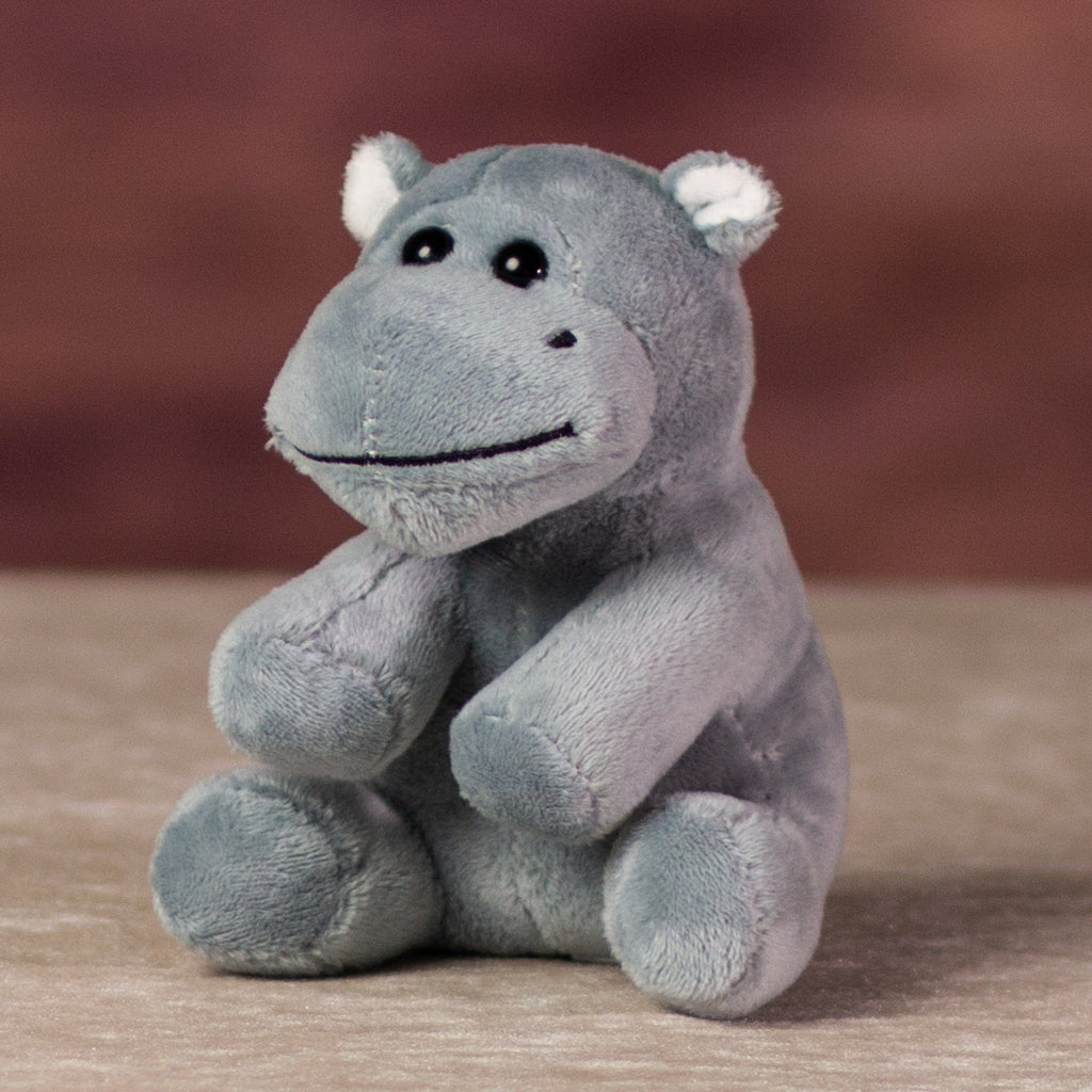 A gray hippo that is 5 inches tall while sitting