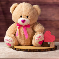 19.5 in stuffed valentines day bear with pink heart nose and paws wearing a bow