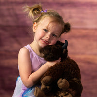 girl holding stuffed  12" Big Ol' Bison