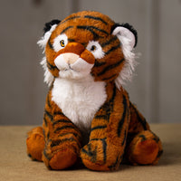 A stripped tiger that is 10 inches tall while sitting