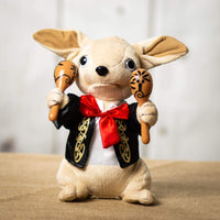 A singing chihuahua that is 11 inches tall while sitting dressed as a mariachi band member holding two maracas