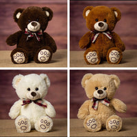 A brown, beige, dark brown and cream bear that are 13 inches tall while standing