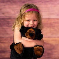 girl holding 10 in stuffed wild black bear