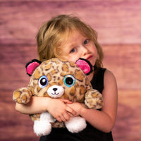 girl holding 8 in stuffed fluffy and spunky cheetah with sparkle eyes