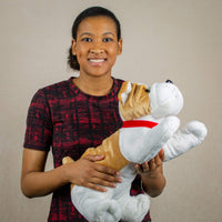 A woman holds a bulldog that is 19 inches from head to tail