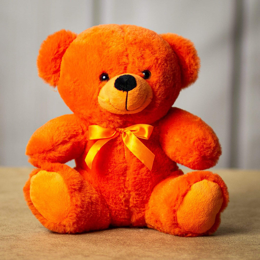 A bright orange bear that's 9 inches tall while sitting