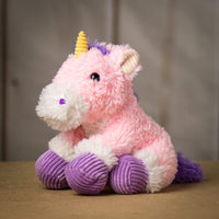 A scruffy pink unicorn that is 9.5 inches tall while sitting