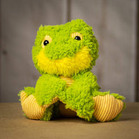 A scruffy green frog that is 9.5 inches tall while sitting