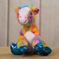 A psychedelic giraffe that is 10.5 inches tall while sitting shiny hooves and sparkly eyes