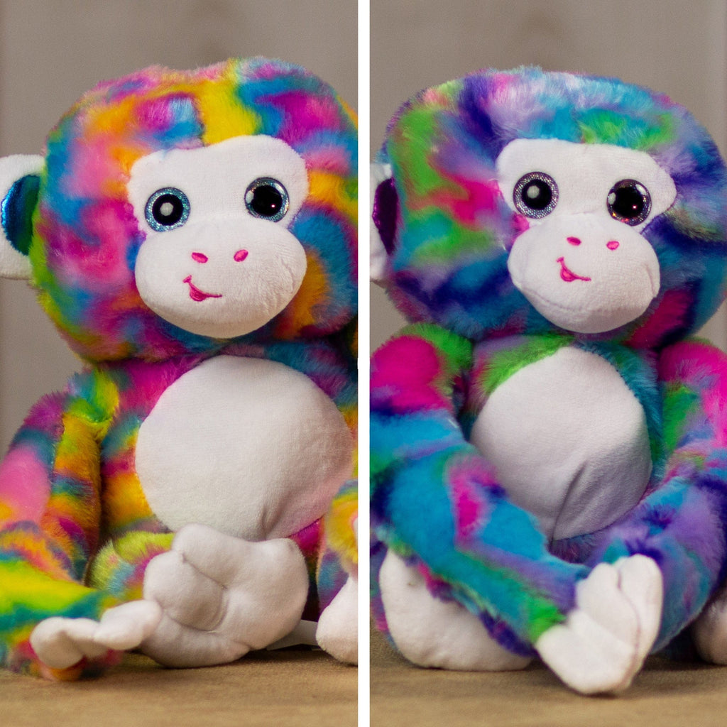 Two psychedelic monkey's that are 15 inches tall from head to toe with shiny ears and sparkle eyes