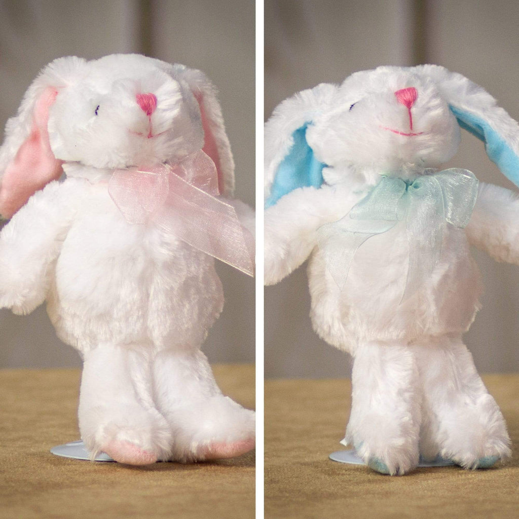 A pair of snow white bunnies that are 8 inches tall while standing with pastel blue and pink trims